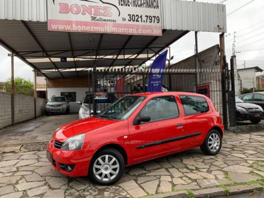 RENAULT - CLIO - 2010/2011 - Vermelha - R$ 20.990,00